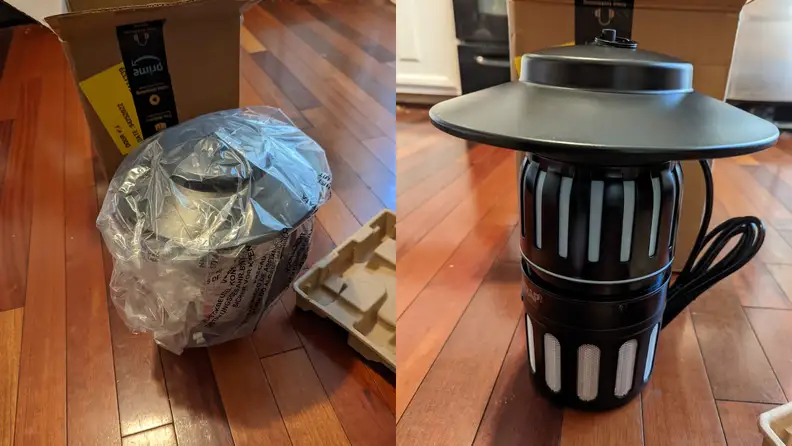 The Dynatrap insect trap outside of original packaging next to box.