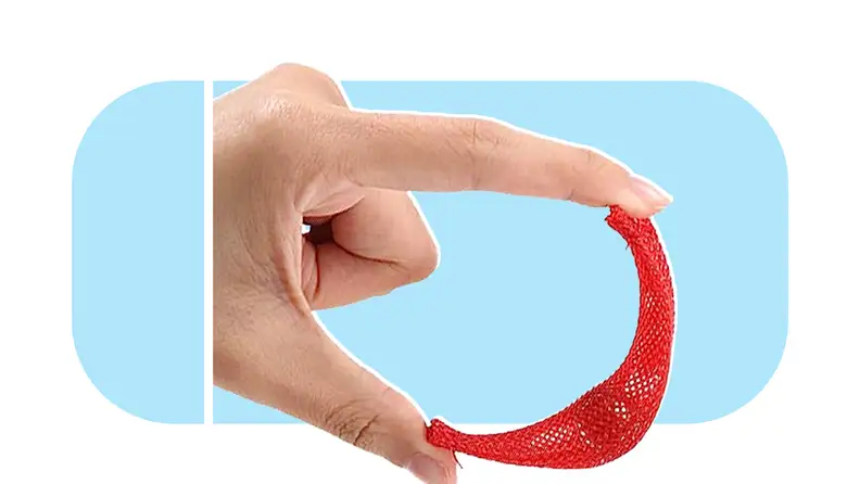 Fingers holding red Marble Mesh Fidget.