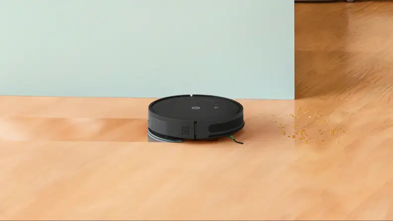 The iRobot Roomba Combo Essential mopping hardwood and vacuuming crumbs.
