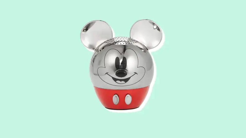 A shiny metal speaker with Mickey ears and a Mickey face.