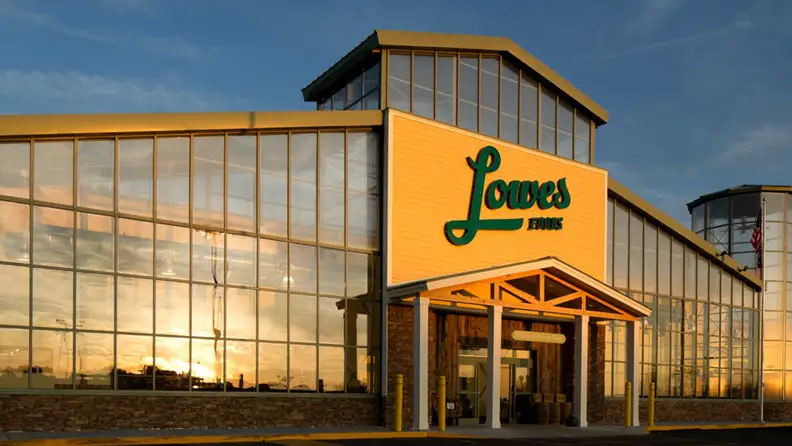 Lowes Foods storefront glowing at sunset