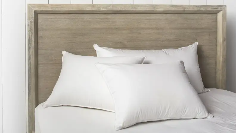 Rest your head on a squishy, yet supportive down-filled pillow.