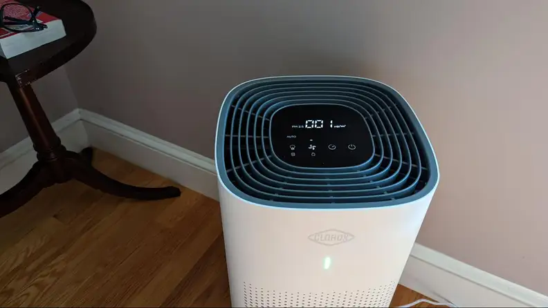 Close-up shot of the air purifier's user interface on the top.