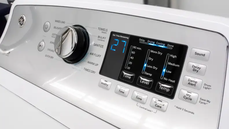 A shot of the GE GTD72EBSNWS's control panel, which consists of both a cycle selection dial and a touchpad for selecting granular customization options.