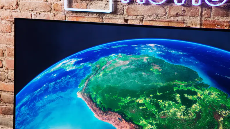 The Sony A95K displaying an overview of planet Earth.