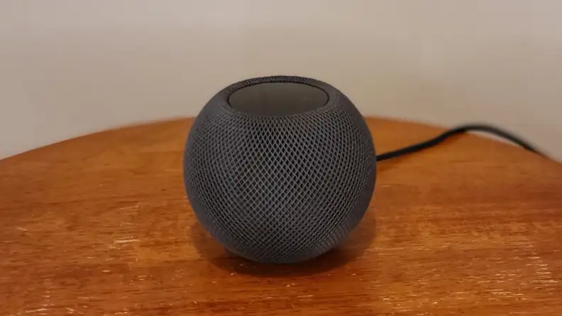 HomePod Mini on brown table