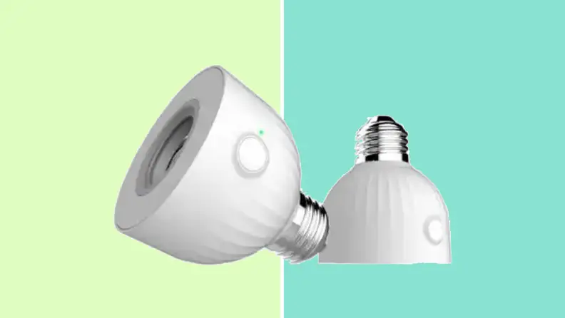 An image of a white lightbulb outlet on its side, next to another outlet turned over.