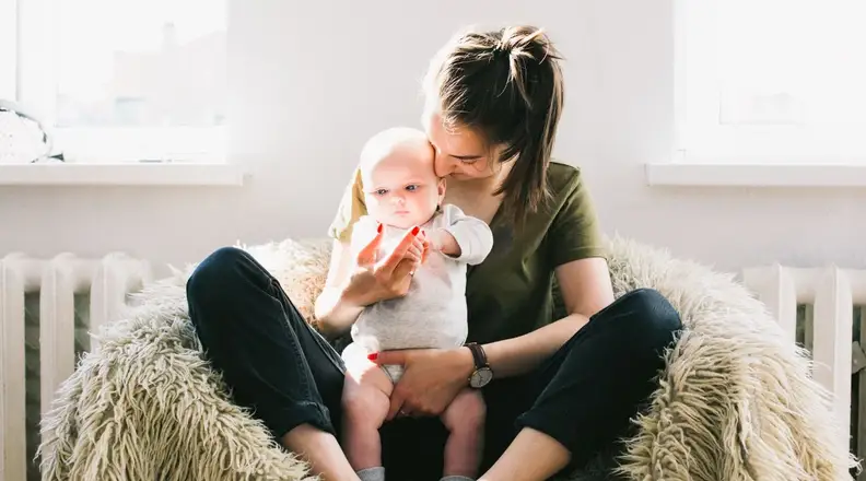 Parent holding baby