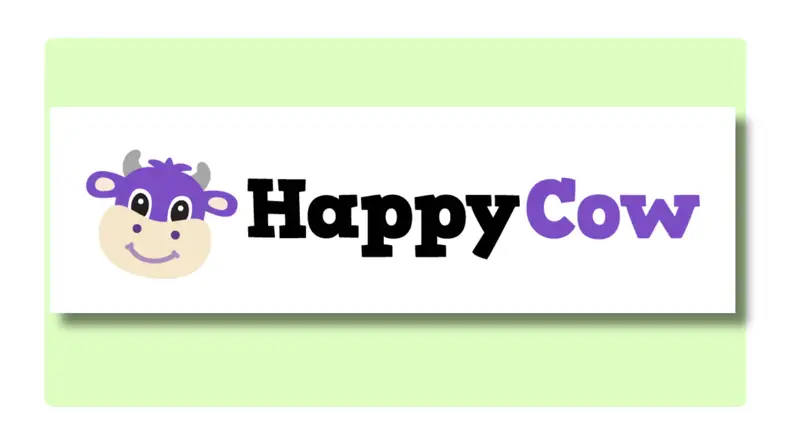 Happy Cow logo on green background.