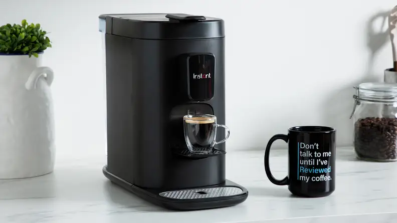 Product shot of the Instant Dual Pod Plus Coffee Maker on kitchen counter.