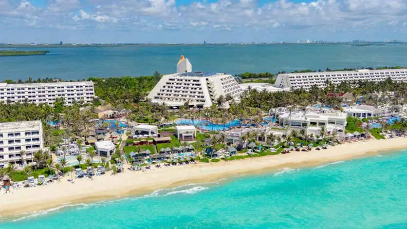 An aerial view of a large resort by the Mexican Caribbean