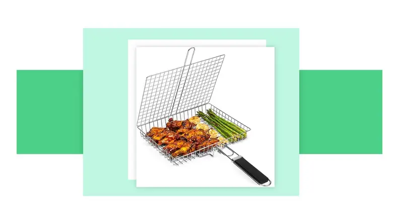 A grill basket in front of a background.