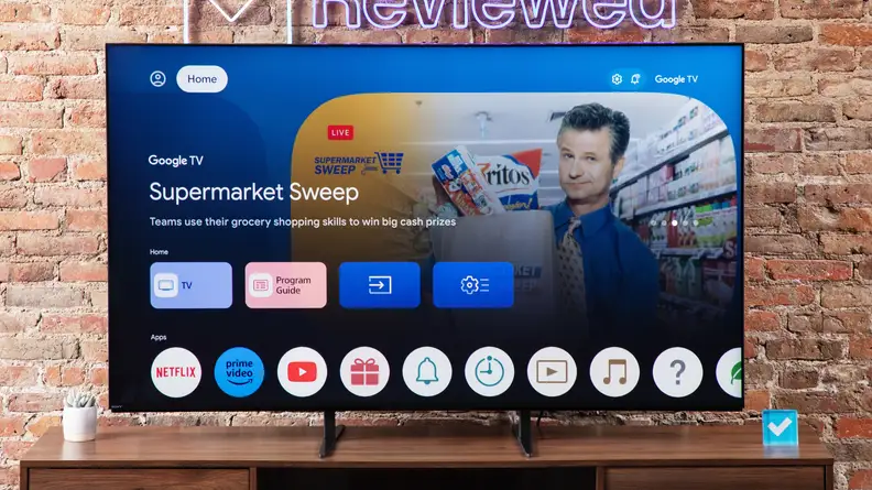 A Sony Bravia 9 Mini-LED TV sitting on a wood entertainment center, with the controls menu on the screen.