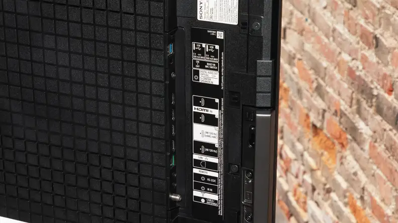 A close-up of the Sony A95L QD-OLED TV's connectivity inputs, located on the back of the TV's panel