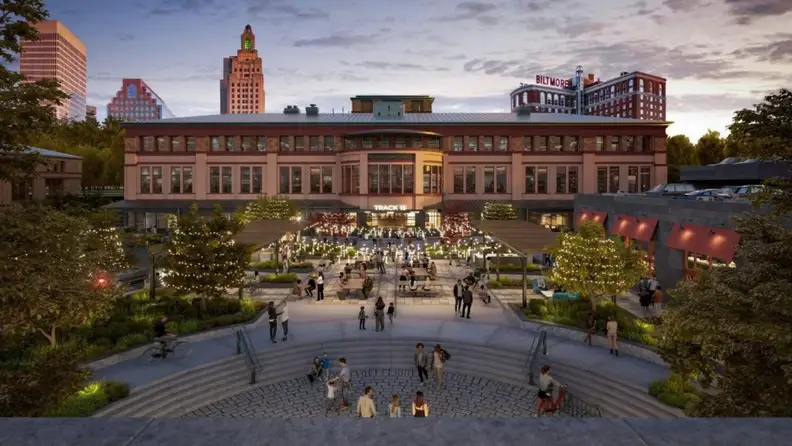Twilight view of Track 15's plaza with string lights