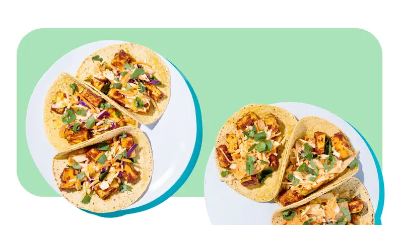 A served plate of corn Korean Tofu Tacos with Kimchi Slaw & Cilantro from the Purple Carrot meal kit.