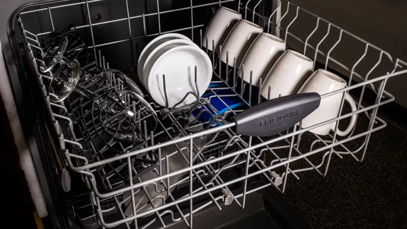 The Frigidaire dishwasher upper rack has specialized tines for odd-shaped bowls.