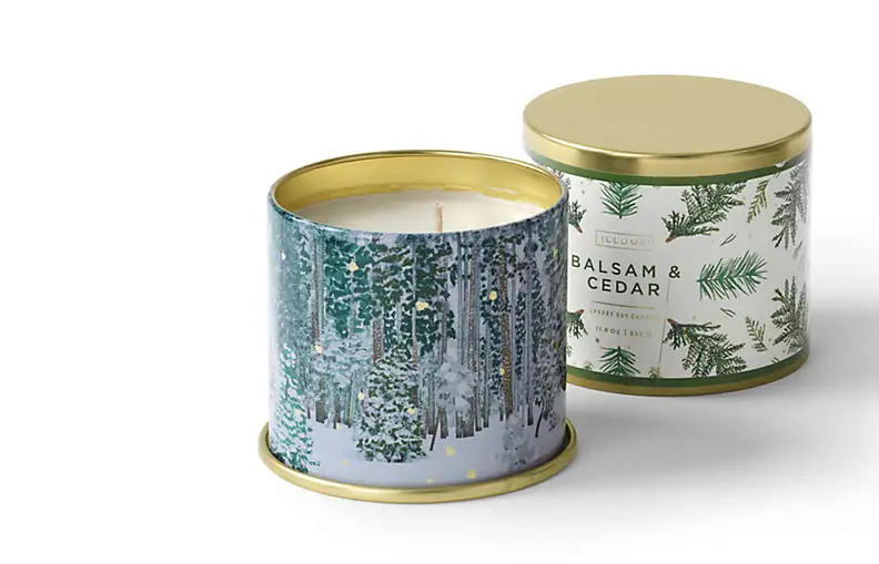Two candles in tins