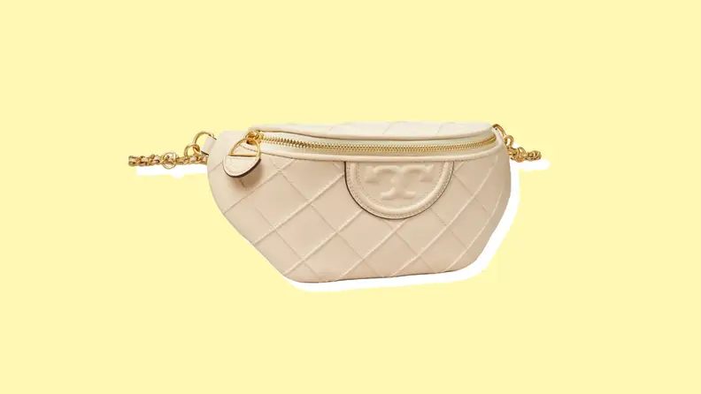 Photo of the Tory Burch Fleming Soft Convertible Belt Bag against a yellow background.