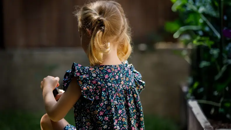 A young girl with inside out pigtails