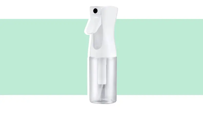 Clear and white misting spray bottle.