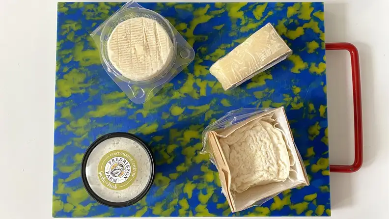 I like to arrange the packaged cheeses on my board before I get started to create a road map for myself.