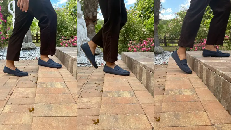 man taking steps up stairs in Rothy's driving loafer
