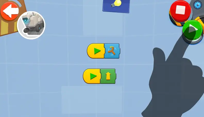 Coding in the LEGO BOOST app involves dragging and dropping icons