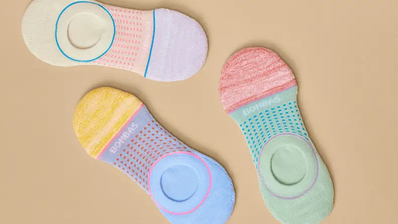 Bombas no-show socks on a beige background