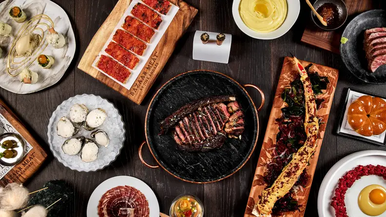 Overlooking a tableful of food on plates