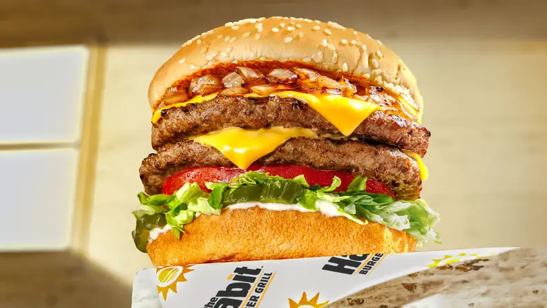 A double cheeseburger with grilled onions from The Habit