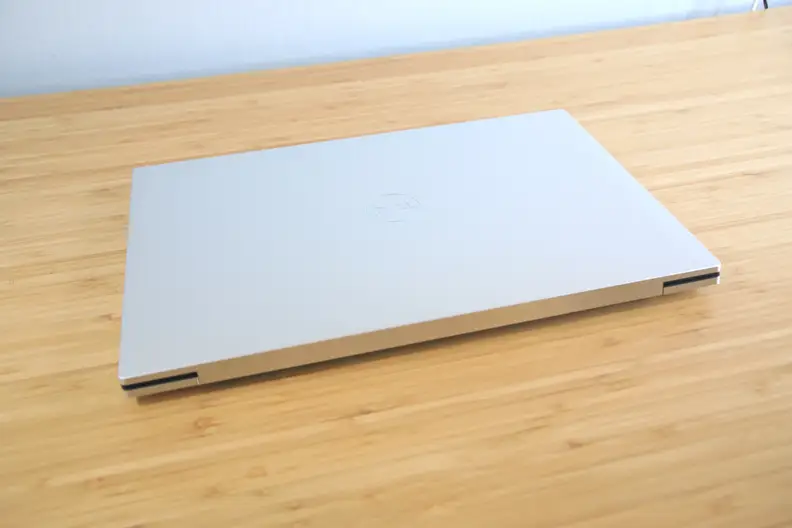 A closed laptop on a desk.