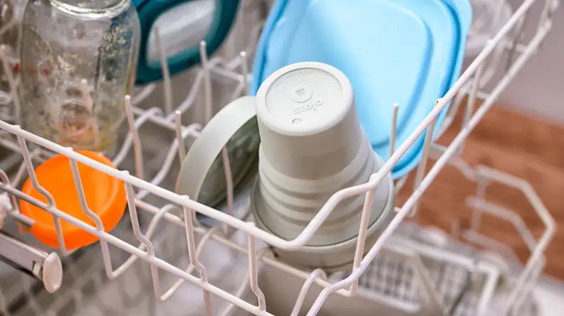A photo of the Stojo Cup inside a dishwasher.