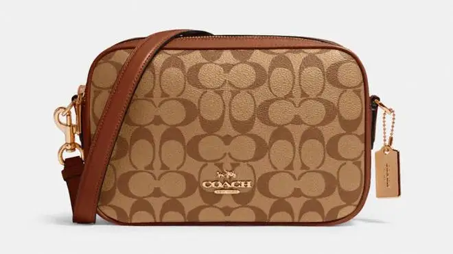 Leather bag in various shades of brown with Coach pattern