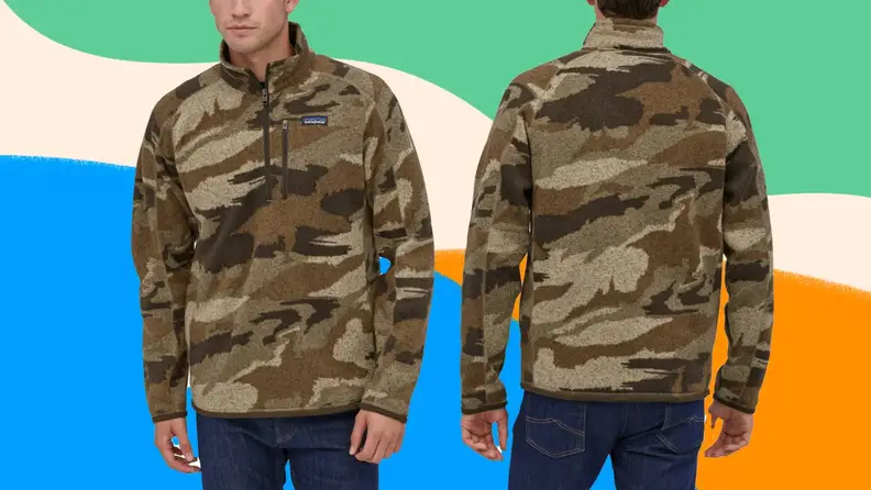 Person wearing camouflage quarter-zip pullover.
