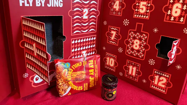 a jar and food package in front of an advent calendar