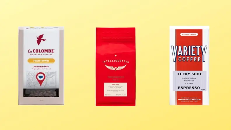 Three bags of medium roast coffee on top of a light yellow background.