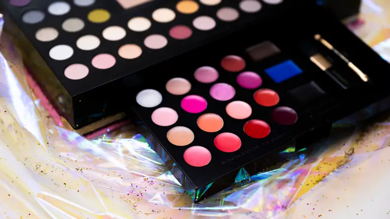 A closeup on the lip glosses in a makeup palette.