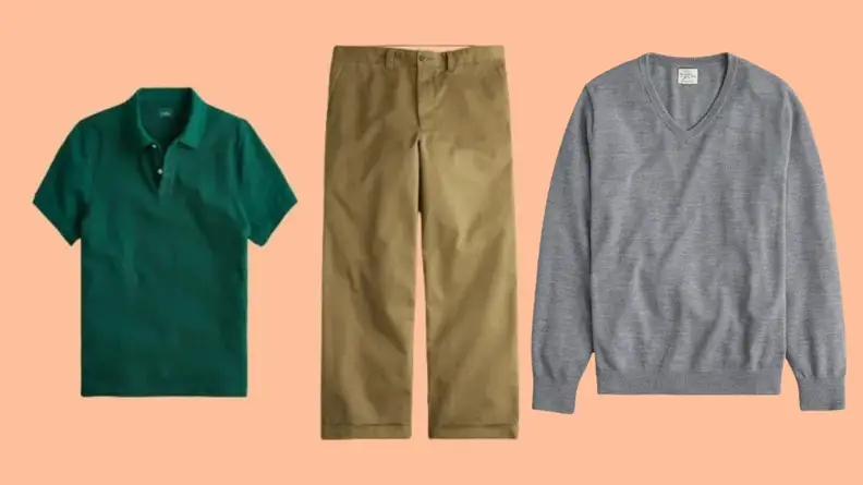 Green polo shirt, khaki oversized pants, and wool v-neck sweater against salmon background