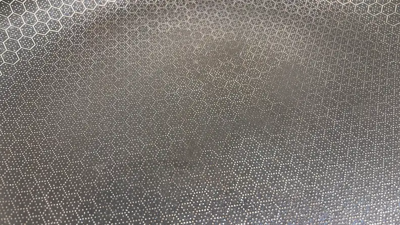 Closeup shot of the nonstick material inside of all of the Hexclad Hybrid cookware.
