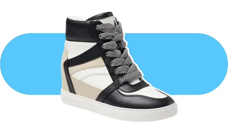 A white wedge sneaker with khaki and black details.