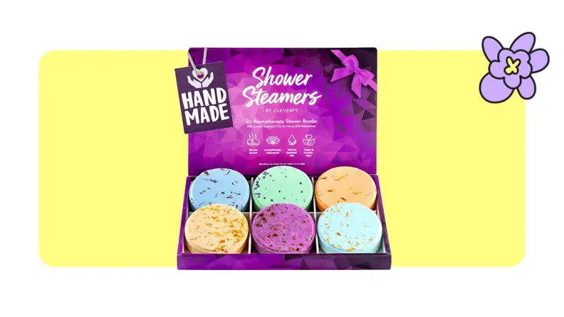 Box of six Cleverfy shower steamers in front of a yellow background with a purple cartoon flower in the corner.