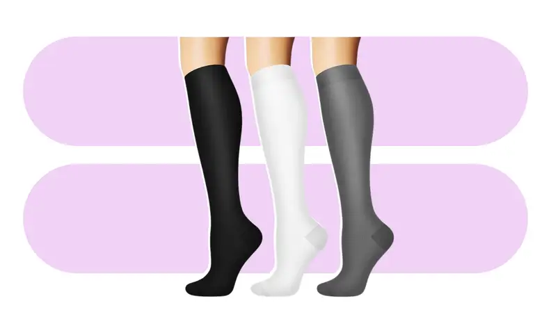 Three tall Sooverki socks, black, white, and gray, against a purple background.