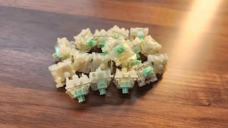 The Baby Kangaroos switches of the Nuphy Halo96 piled on a surface.