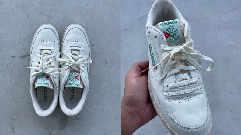 Reebok Club C 85 Vintage exterior, showing off yellow-tinted outsoles and off-white leather uppers.