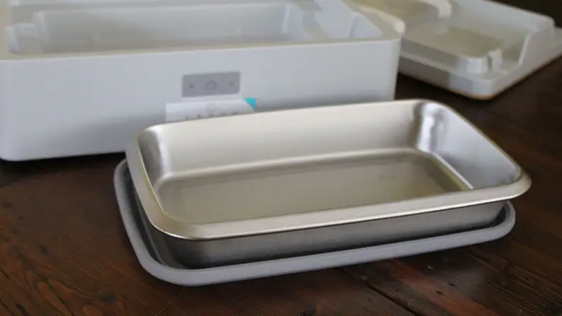 The Steambox metal container resting on top of its silicone cover.