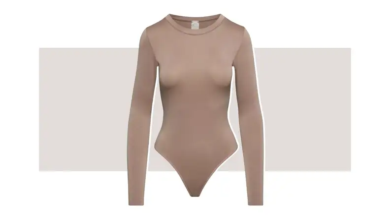 A taupe bodysuit with long sleeves.