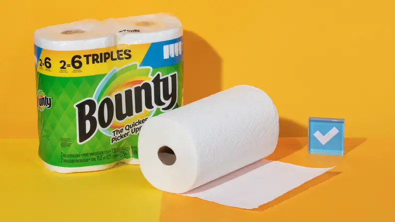 A roll of Bounty paper towels on an orange background.