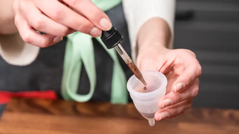 woman testing menstrual cups