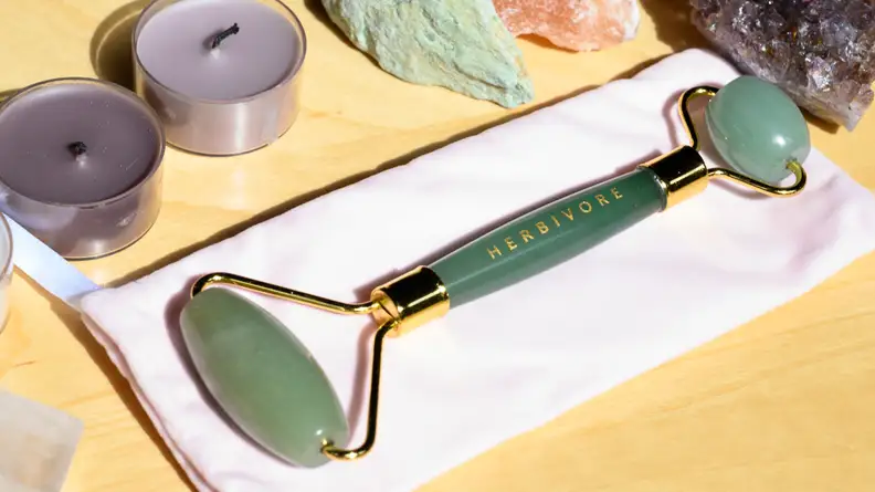 A photo of the Herbivore Jade Facial Roller.